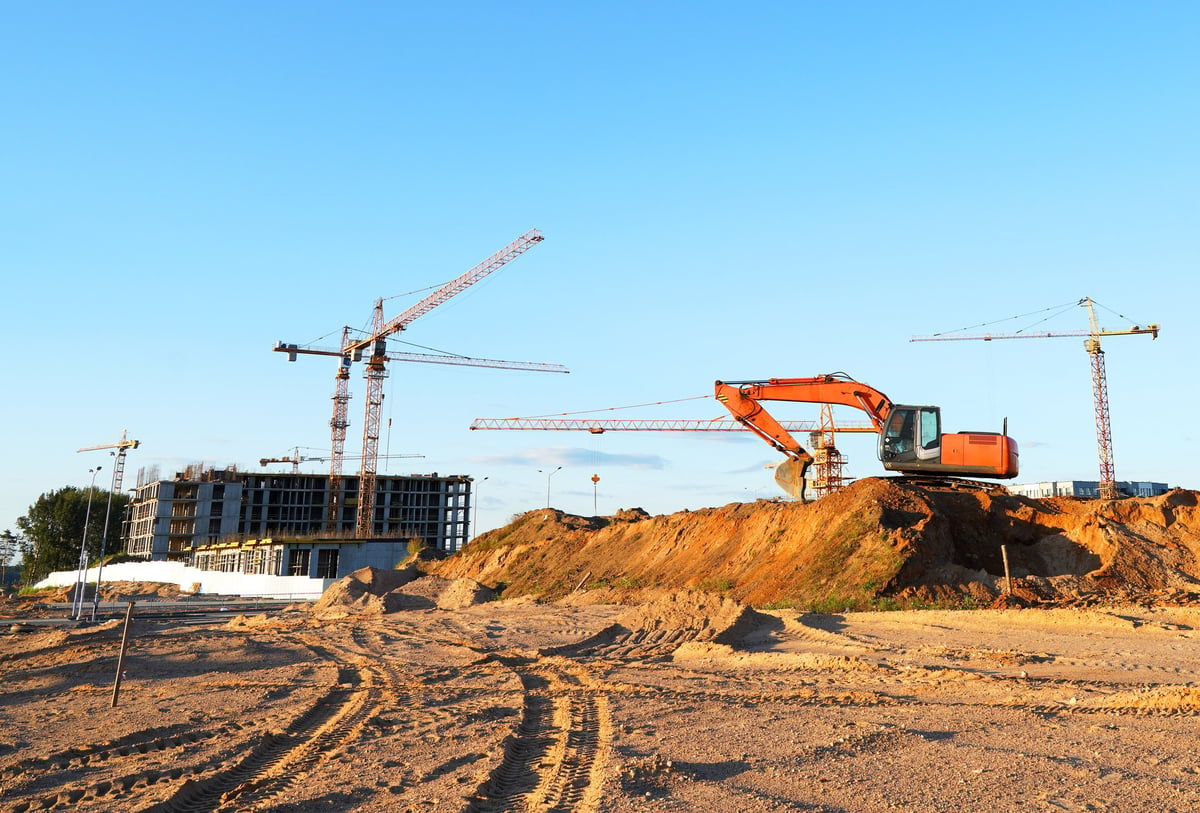 Construction site. Buildings under construction. Tower Cranes on Residential Buildings construction.